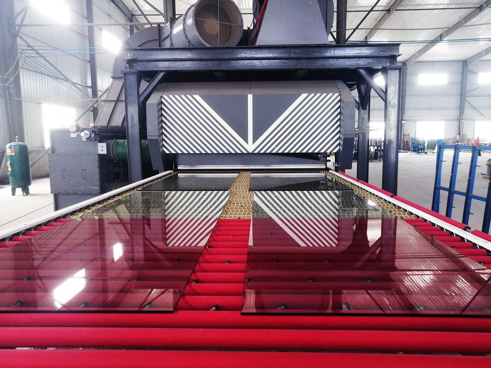 glass enters the tempering furnace and is heated uniformly glass enters the tempering furnace and is heated uniformly