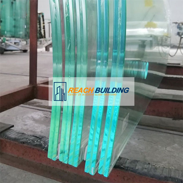 Architectural curved glass facade showcasing modern bending applications