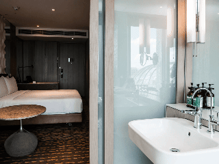 SpectraVeil PDLC glass for hotel bathrooms and suites
